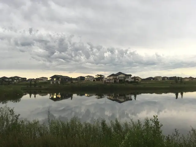 Houses across the lake in Pilot Butte